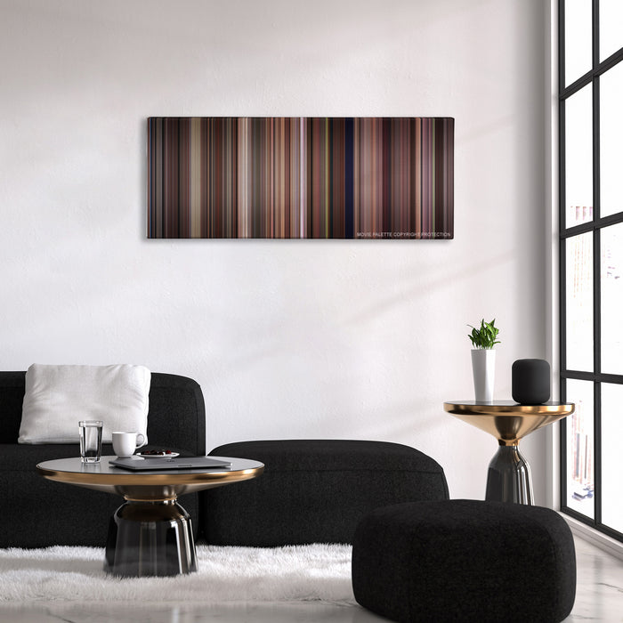 Tootsie color palette canvas above a black sofa with a gold-topped table