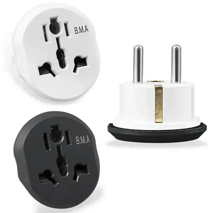 A close up of a white and black plug and a black and white plug