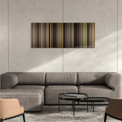 We Bought a Zoo color palette canvas on a concrete wall above a gray sectional sofa