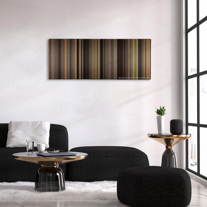 We Bought a Zoo color palette canvas above a black sofa with a gold-topped table