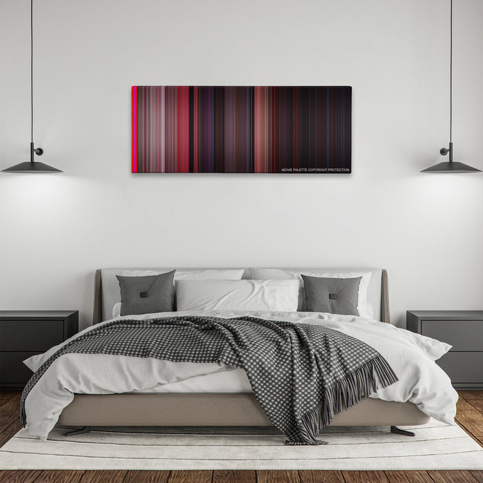 West Side Story color palette canvas above a bed, between two black pendant lamps