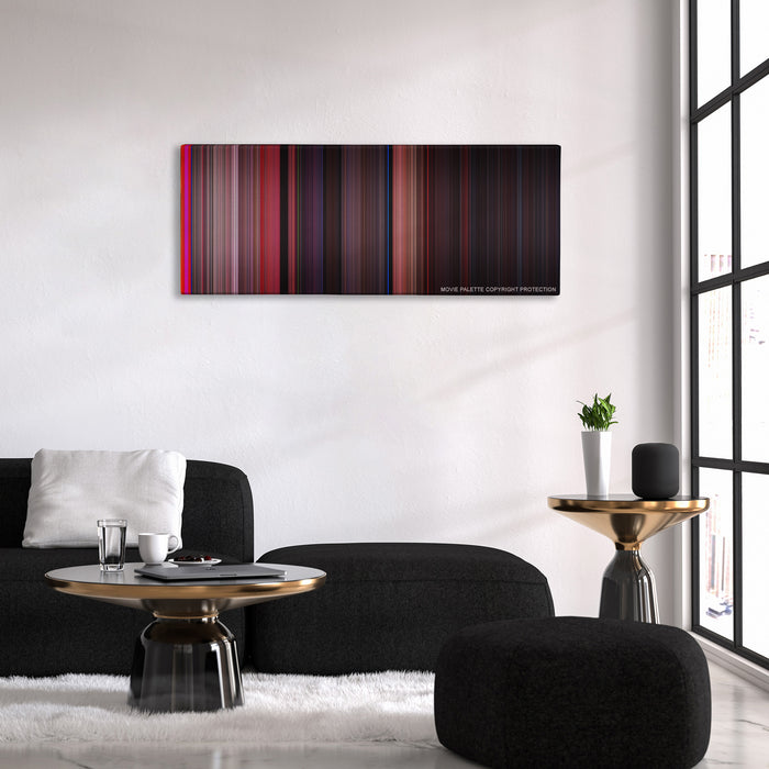 West Side Story color palette canvas above a black sofa with a gold-topped table