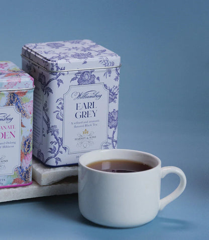 Williamsburg Earl Grey Tea by Harney & Sons — tea packaging and serving presentation; styled props are separate