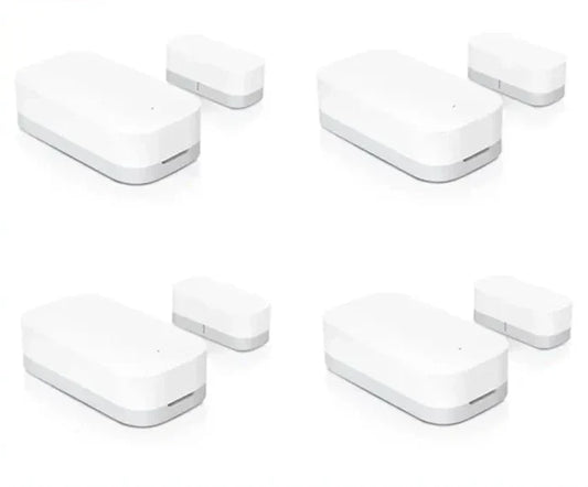 Four different views of a door window sensor